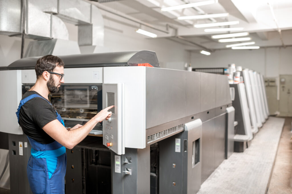 Printing operator working at the manufacturing